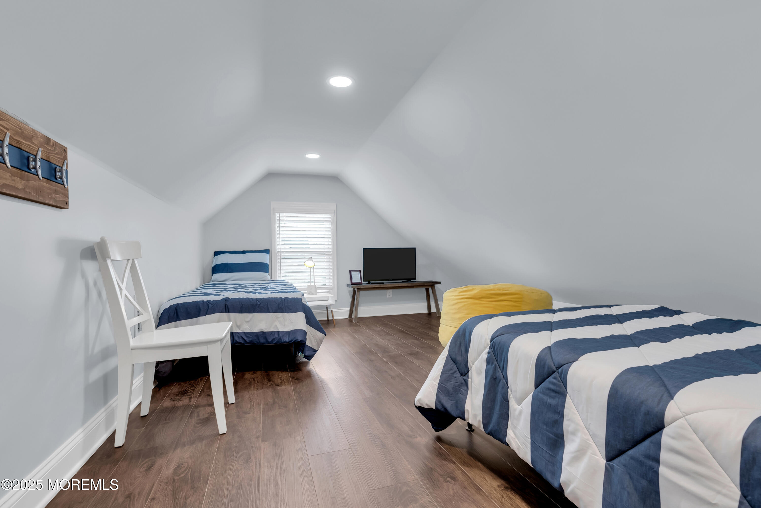 52 Embury Avenue Ocean Grove, NJ 07756 - Photo 39 of 88 a bedroom with a bed and a table