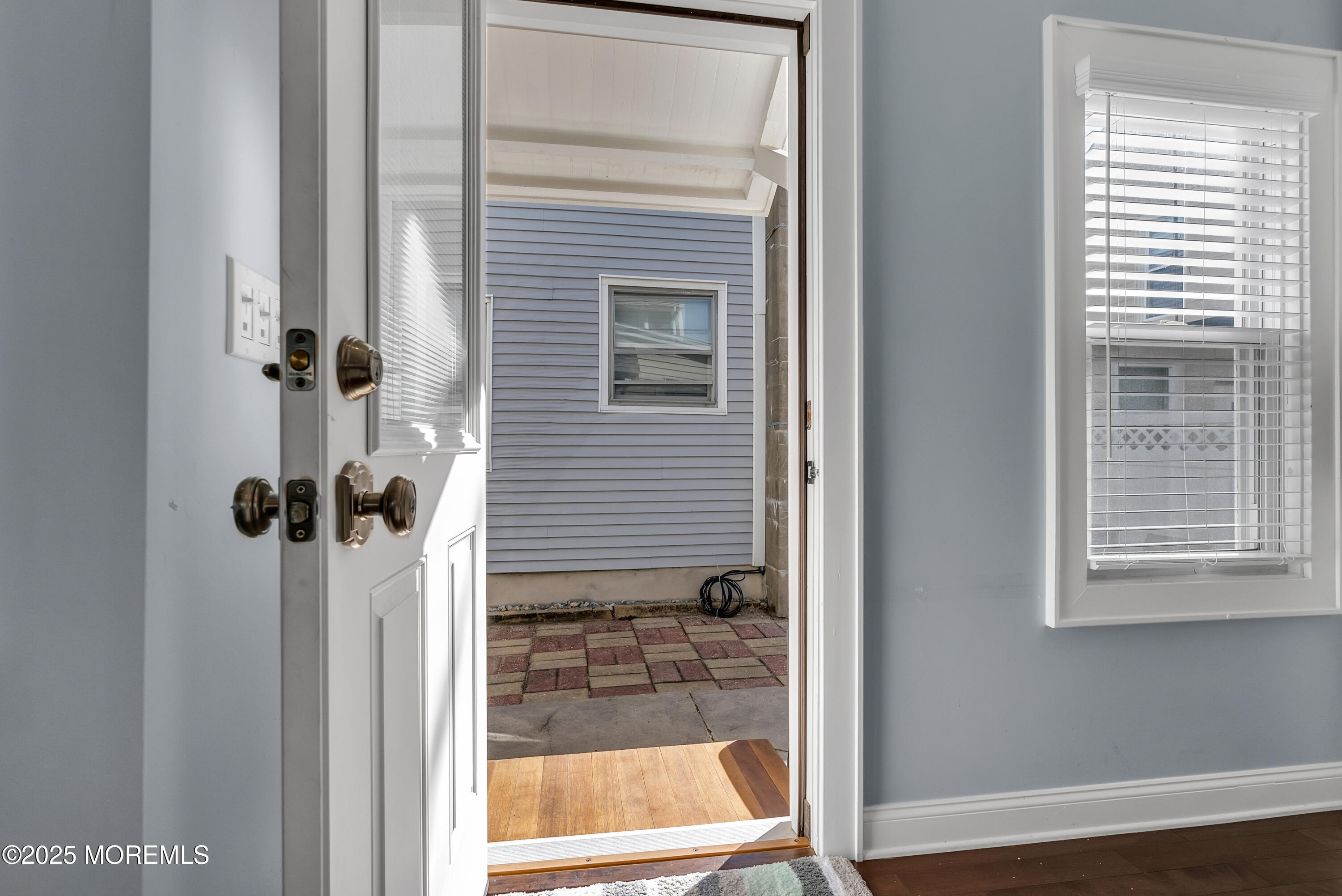 52 Embury Avenue Ocean Grove, NJ 07756 - Photo 41 of 88 a view of a door and a window