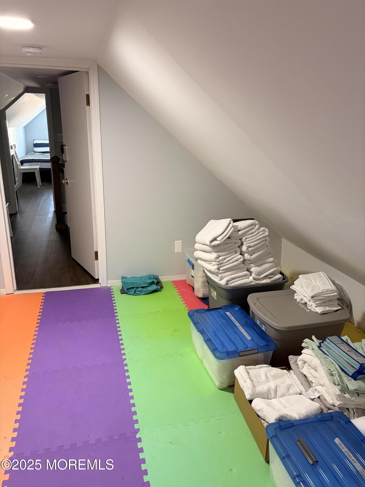 52 Embury Avenue Ocean Grove, NJ 07756 - Photo 48 of 88 a room with furniture and wooden floor