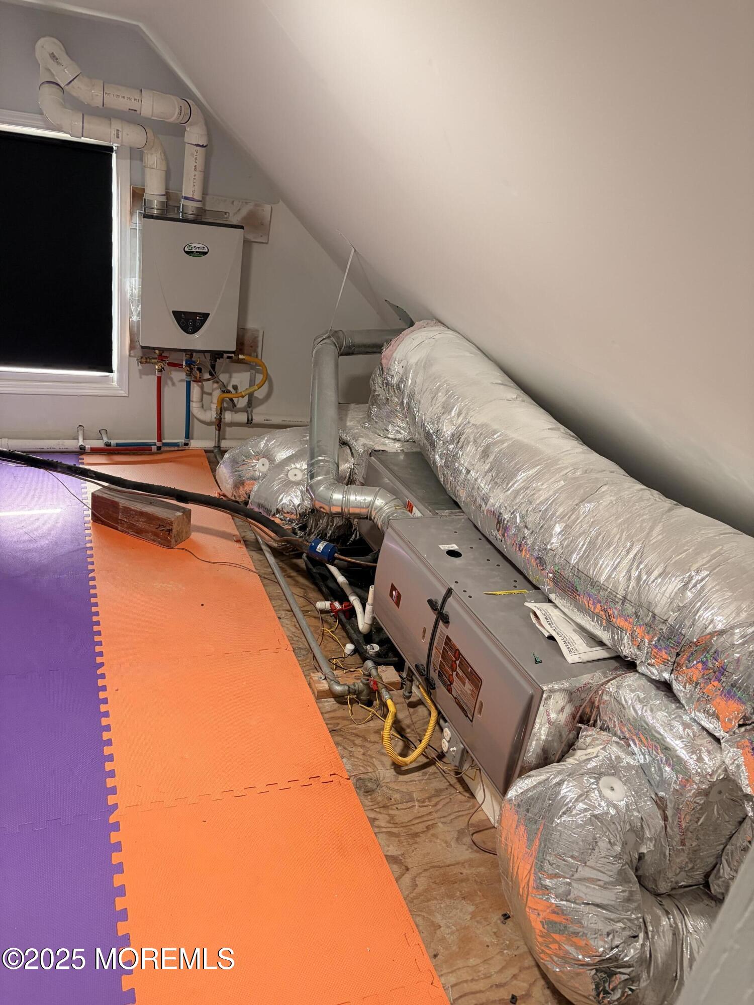 52 Embury Avenue Ocean Grove, NJ 07756 - Photo 49 of 88 a room with furniture and flat screen tv