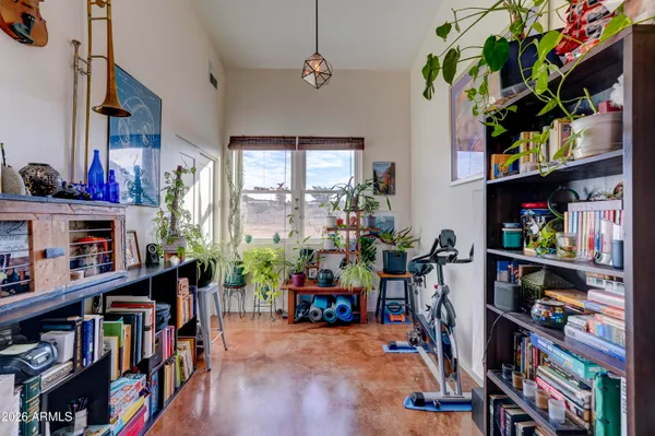 a room with furniture and a book shelf