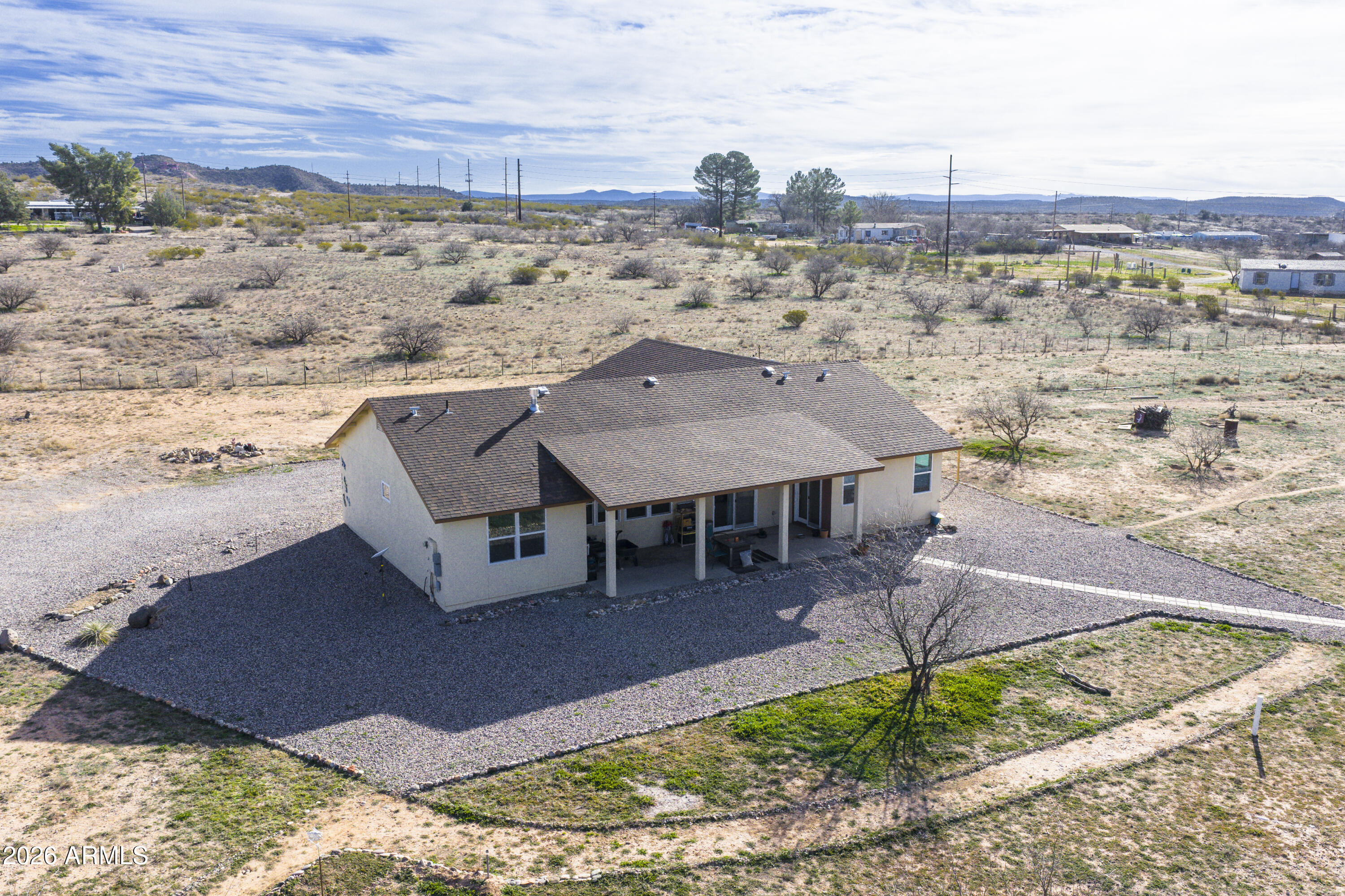 2771 South Country Hill Road Cornville, AZ 86325 - Photo 5 of 20 a view of a terrace with a bench