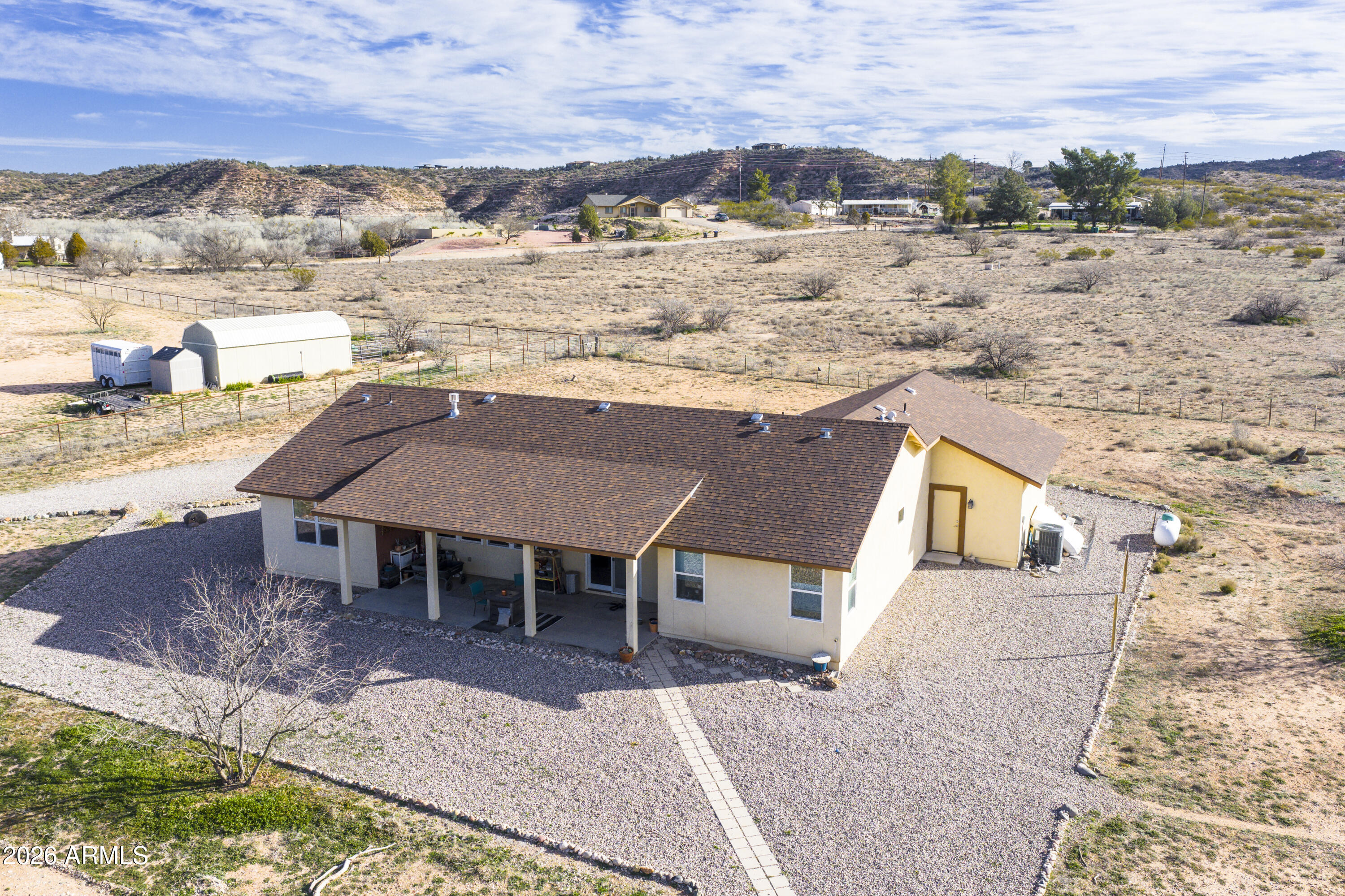 2771 South Country Hill Road Cornville, AZ 86325 - Photo 7 of 20 a view of a terrace with a table and chairs