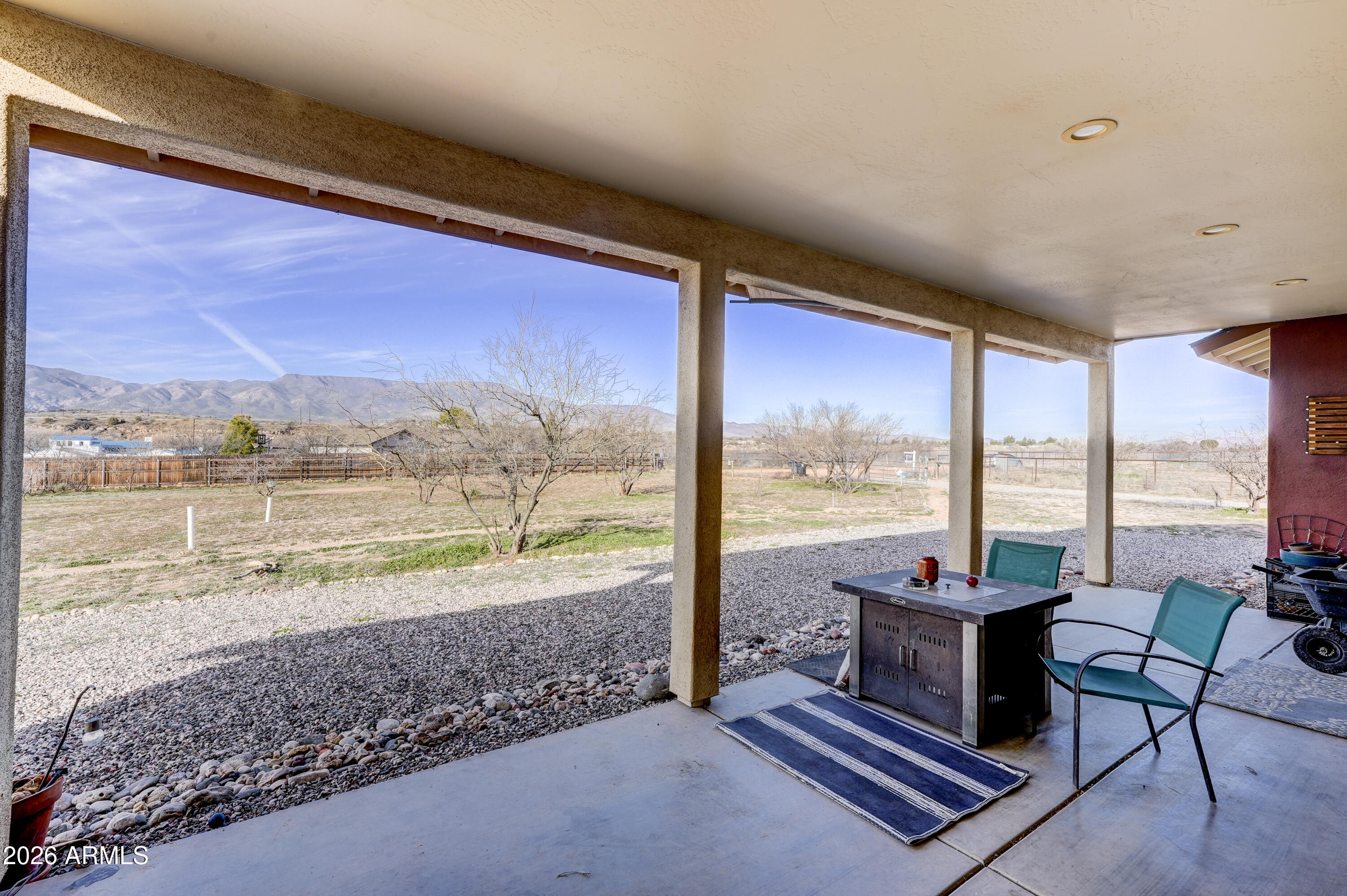 2771 South Country Hill Road Cornville, AZ 86325 - Photo 8 of 20 a living room with furniture and floor to ceiling windows