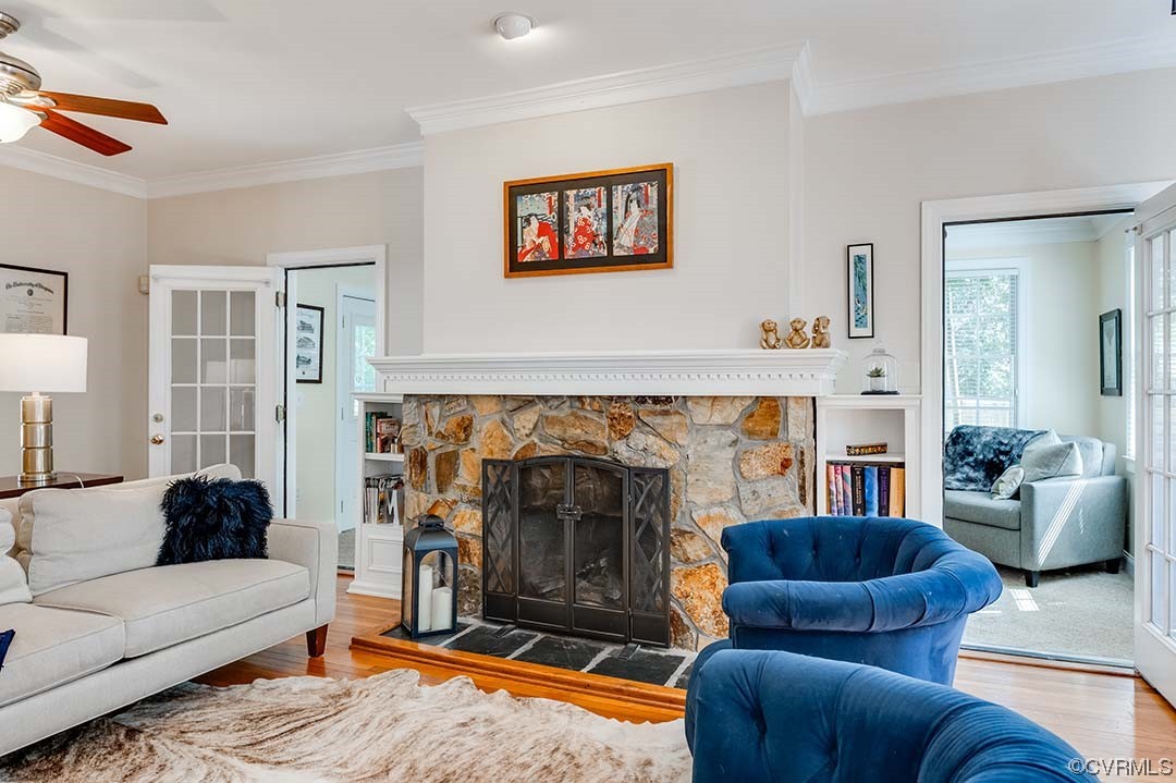 5009 Devonshire Road Richmond, VA 23225 - Photo 12 of 43 a living room with furniture and a fireplace