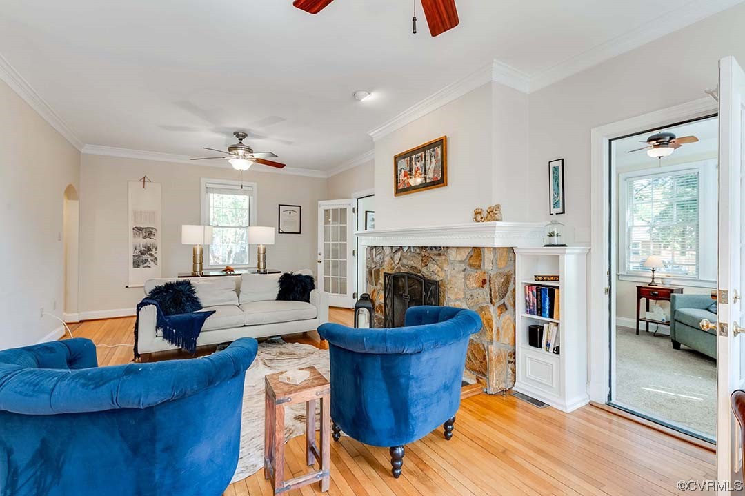 5009 Devonshire Road Richmond, VA 23225 - Photo 13 of 43 a living room with furniture and a fireplace