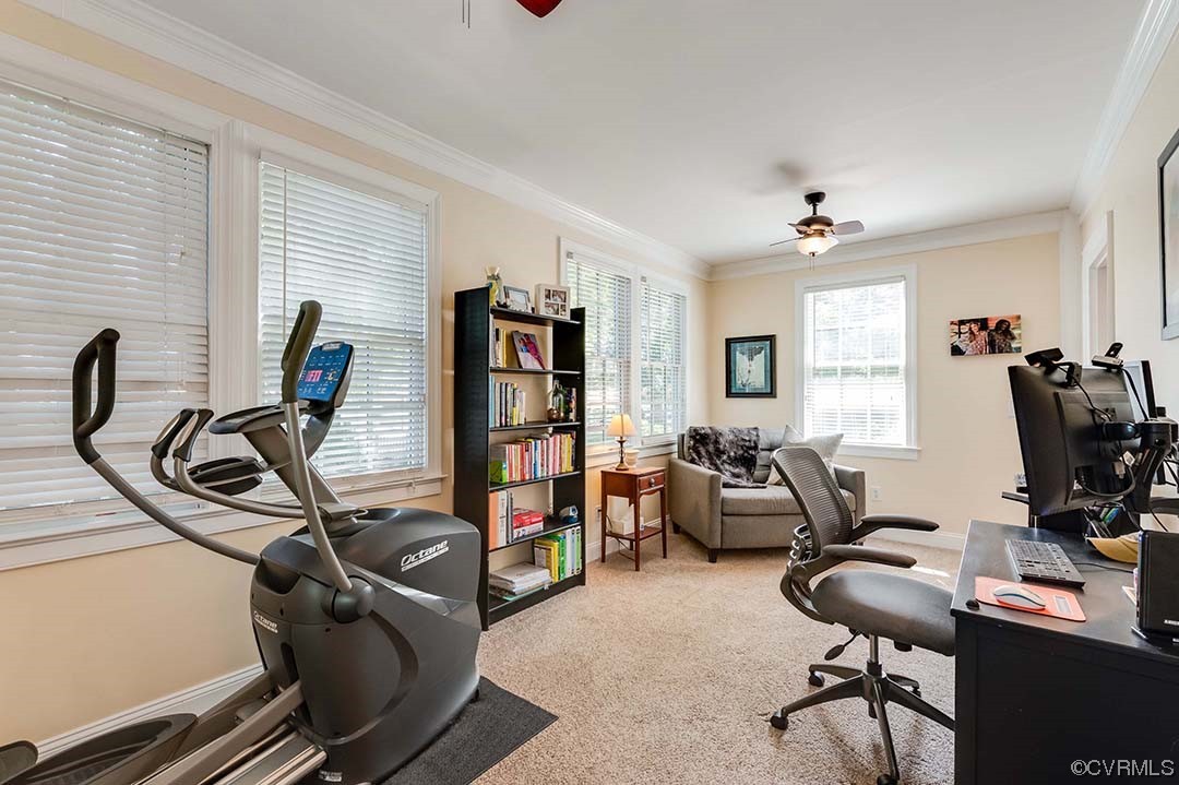 5009 Devonshire Road Richmond, VA 23225 - Photo 15 of 43 a view of a workspace with furniture and a window