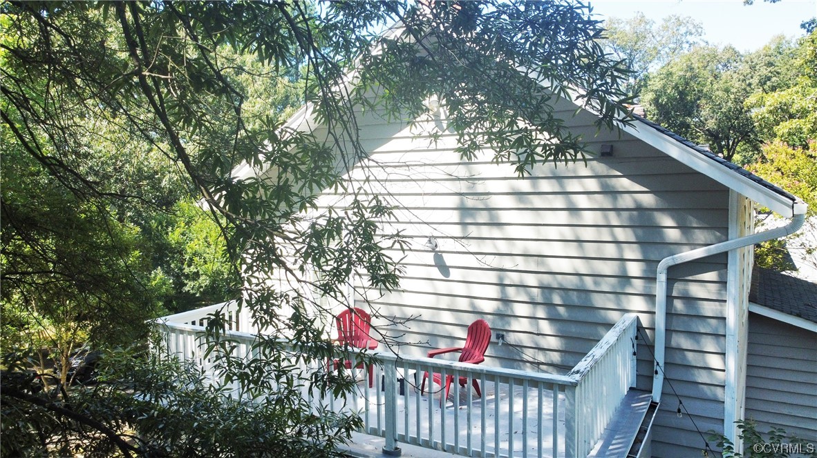 5009 Devonshire Road Richmond, VA 23225 - Photo 28 of 43 a view of a balcony with a tree