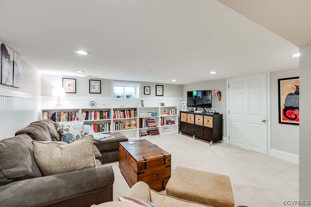 5009 Devonshire Road Richmond, VA 23225 - Photo 29 of 43 a living room with furniture and a couch