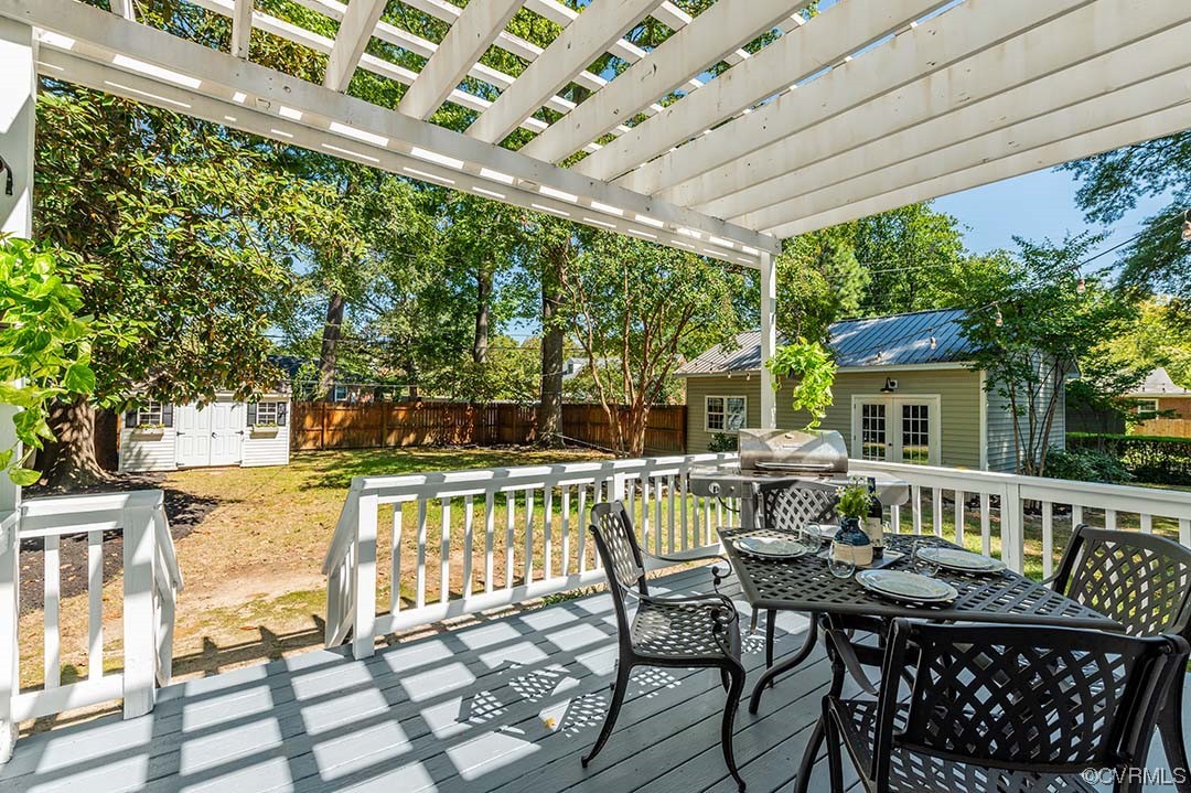 5009 Devonshire Road Richmond, VA 23225 - Photo 34 of 43 a view of a patio with a table and chairs