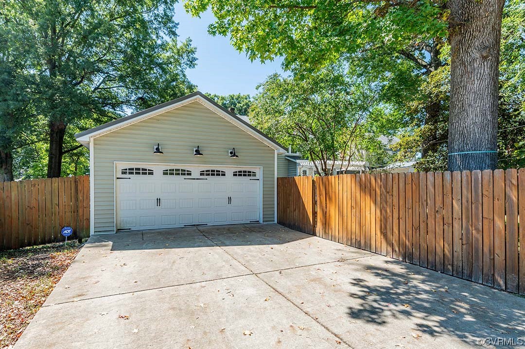 5009 Devonshire Road Richmond, VA 23225 - Photo 38 of 43 a view of a wooden fence and a trees