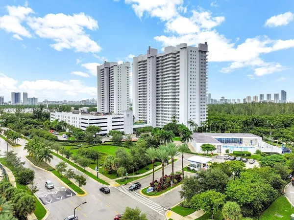 a view of a city with tall buildings
