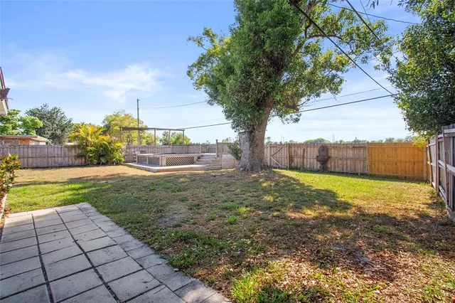 a view of a yard with an trees