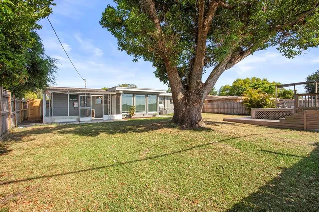 a house with trees in front of it