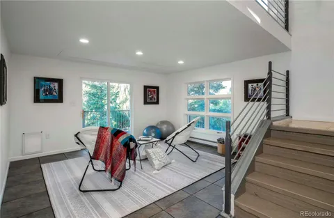 a view of entryway livingroom and hall with wooden floor