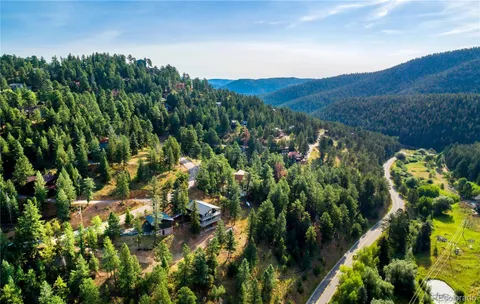 a view of a lake with a mountain in the background