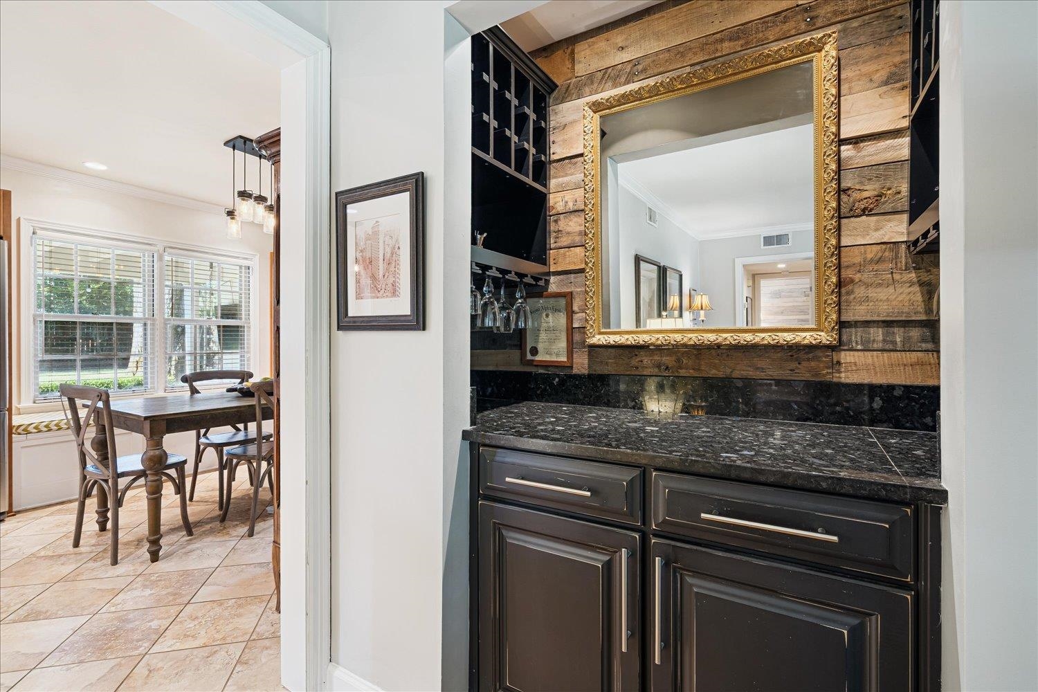 4047 Minden Road Memphis, TN 38117 - Photo 8 of 36 a kitchen with granite countertop a sink and a refrigerator