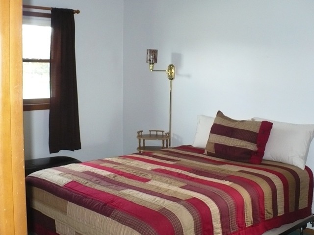 1230 Springdale Drive Rochelle, IL 61068 - Photo 11 of 22 a bedroom with a bed and window