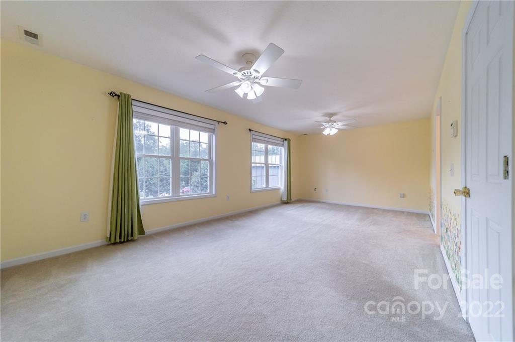 3446 Raintree Drive Hudson, NC 28638 - Photo 12 of 24 a view of a livingroom with a ceiling fan and window