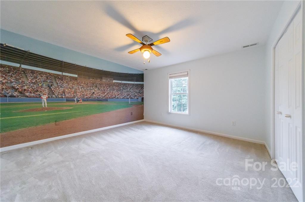 3446 Raintree Drive Hudson, NC 28638 - Photo 19 of 24 a view of a room with a ceiling fan and window