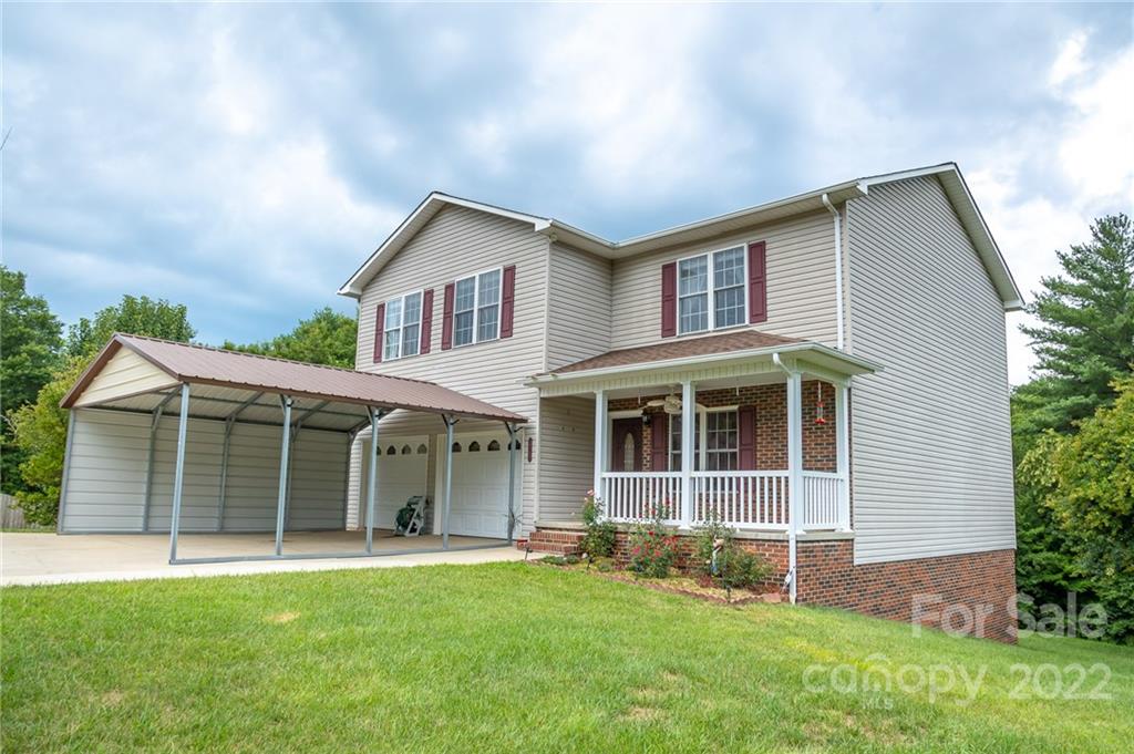 3446 Raintree Drive Hudson, NC 28638 - Photo 24 of 24 front view of a house with a yard