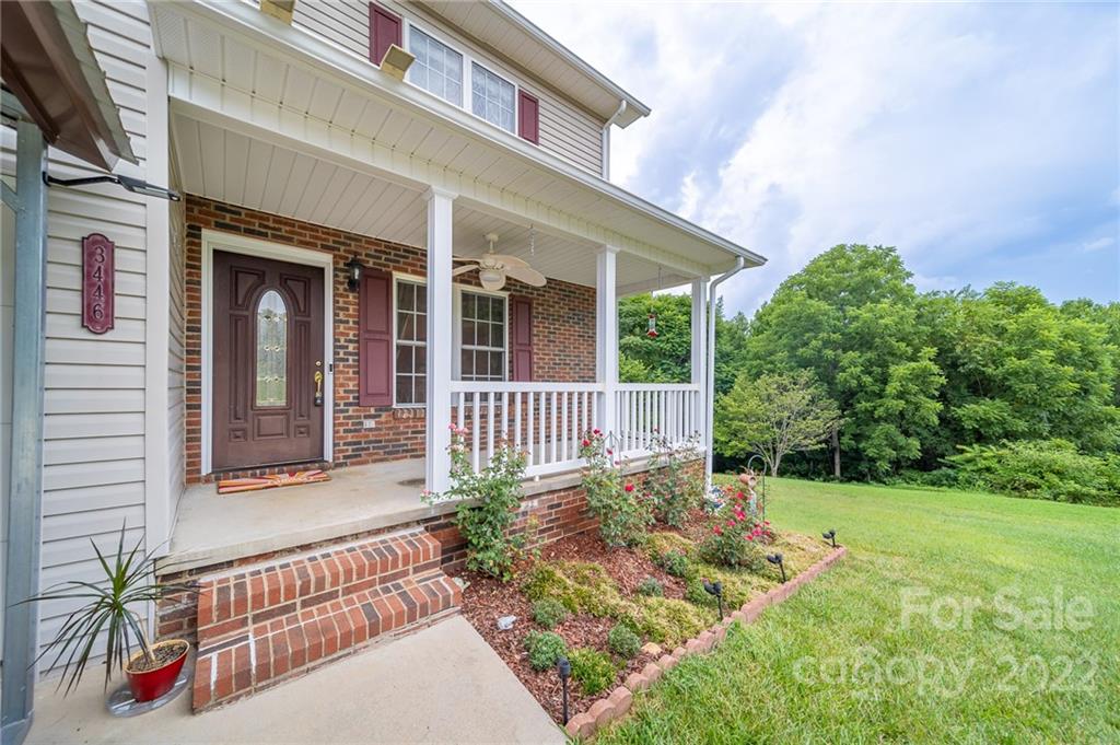 3446 Raintree Drive Hudson, NC 28638 - Photo 3 of 24 front view of a house with a yard