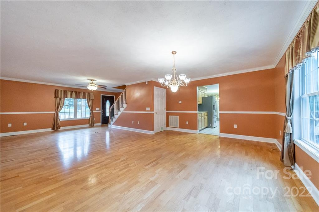 3446 Raintree Drive Hudson, NC 28638 - Photo 6 of 24 wooden floor in an empty room with a window