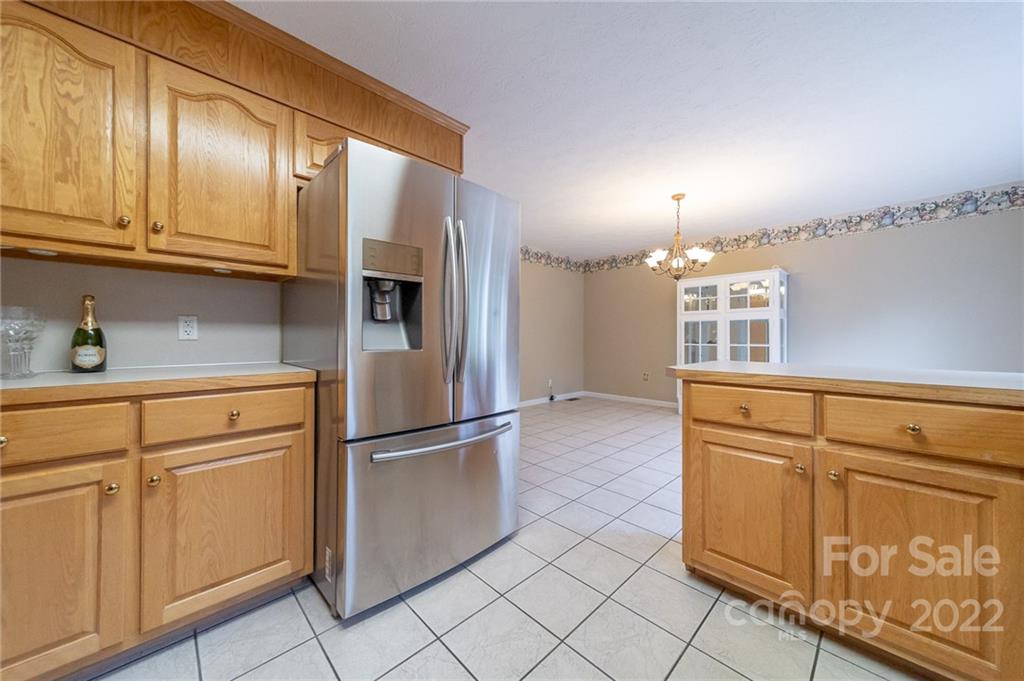 3446 Raintree Drive Hudson, NC 28638 - Photo 10 of 24 a kitchen with granite countertop cabinets stainless steel appliances and a counter space