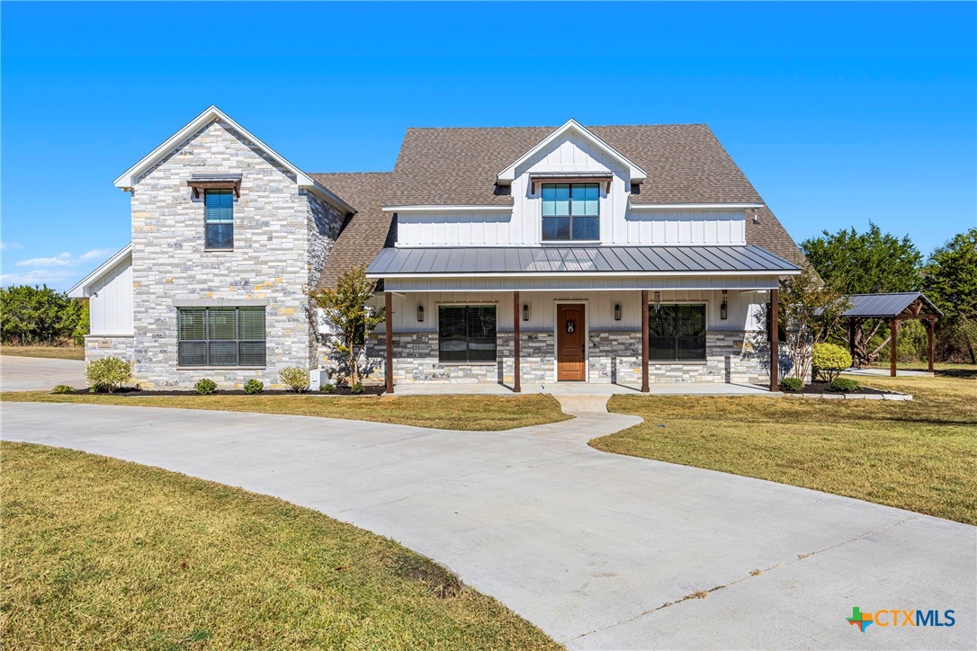 360 Grove Road Killeen, TX 76542 - Photo 1 of 48 a front view of a house with swimming pool and glass windows