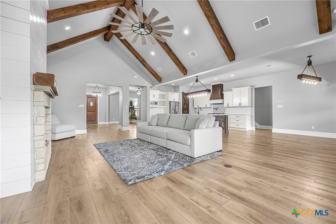 360 Grove Road Killeen, TX 76542 - Photo 11 of 48 a living room with furniture and a wooden floor