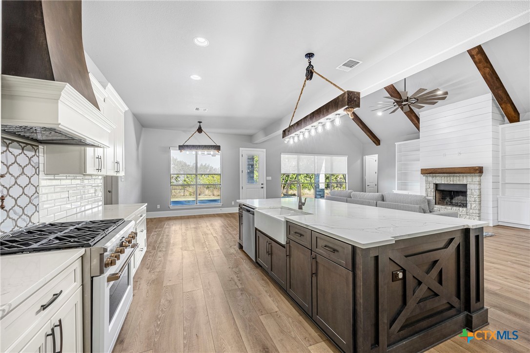 360 Grove Road Killeen, TX 76542 - Photo 16 of 48 a kitchen with sink stove and refrigerator