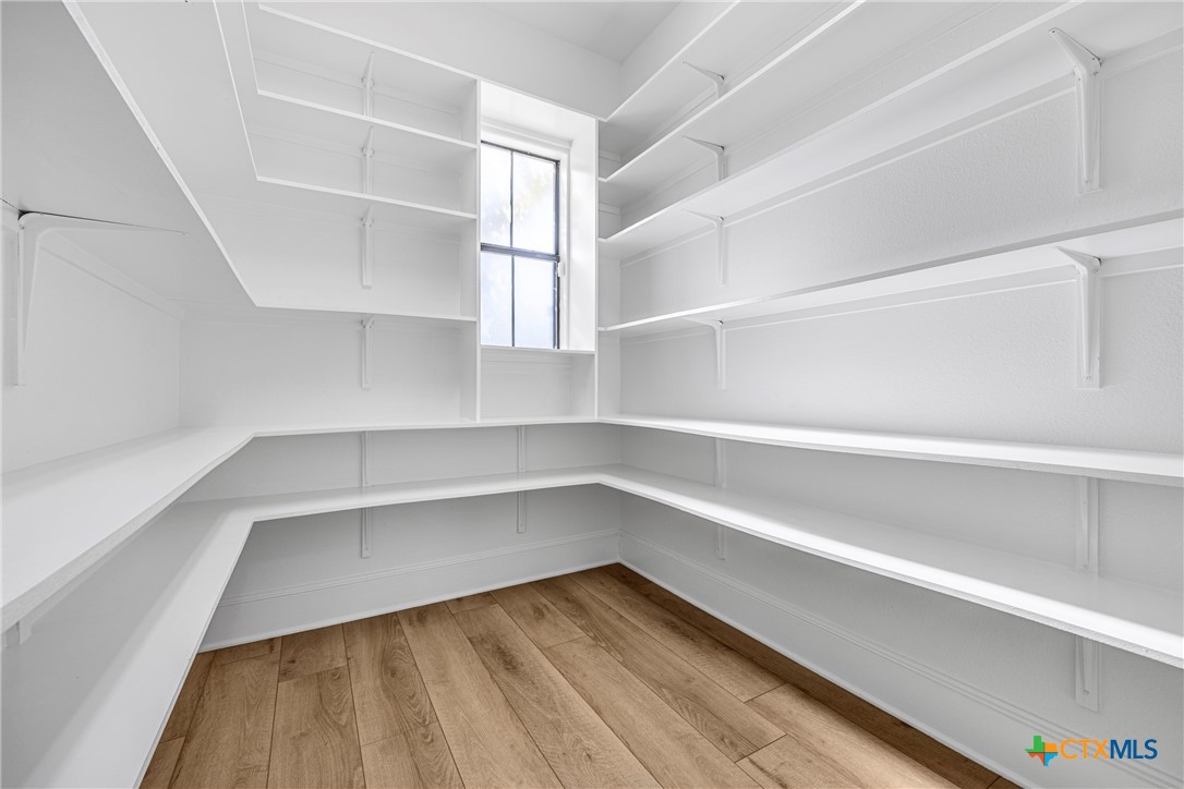 360 Grove Road Killeen, TX 76542 - Photo 17 of 48 a view of walk in closet with empty racks