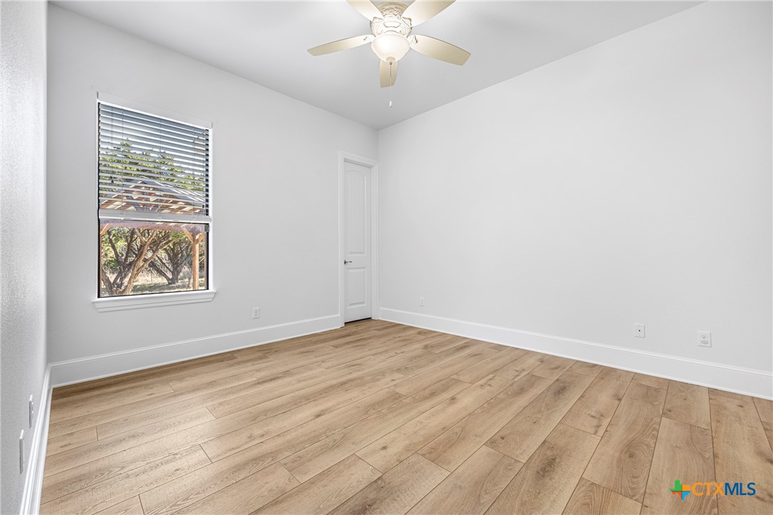 360 Grove Road Killeen, TX 76542 - Photo 28 of 48 wooden floor in an empty room with a window