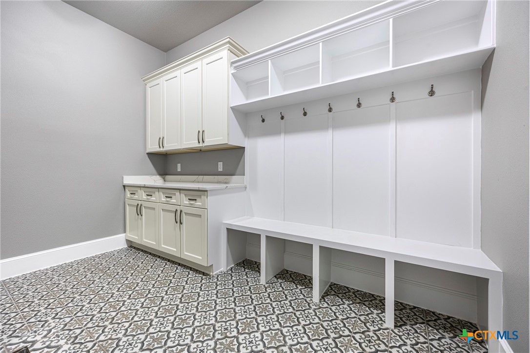360 Grove Road Killeen, TX 76542 - Photo 41 of 48 a kitchen with a stove a sink and a refrigerator