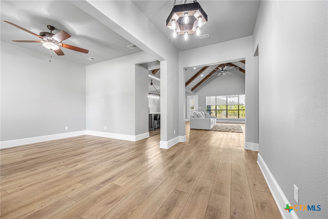 360 Grove Road Killeen, TX 76542 - Photo 7 of 48 wooden floor in an empty room with a window