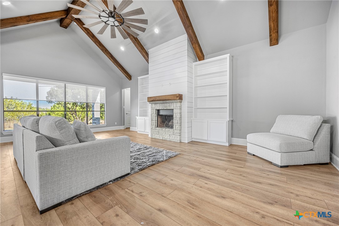 360 Grove Road Killeen, TX 76542 - Photo 10 of 48 a living room with furniture and a fireplace