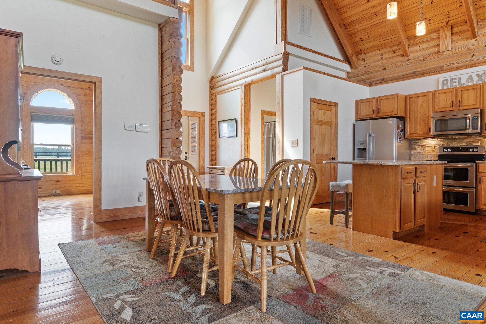 42 River Ridge Lane Stanardsville, VA 22973 - Photo 12 of 70 a view of a dining room with furniture