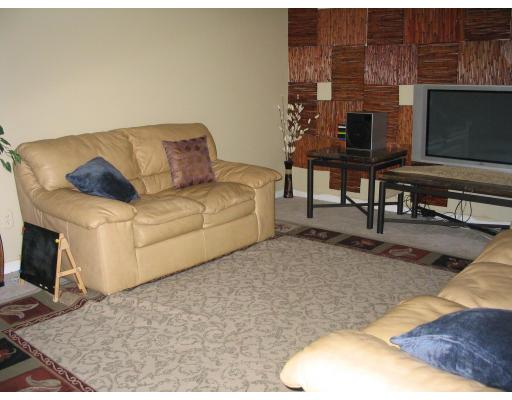 49 Newhall Street Springfield, MA 01109 - Photo 2 of 12 a living room with furniture and a flat screen tv