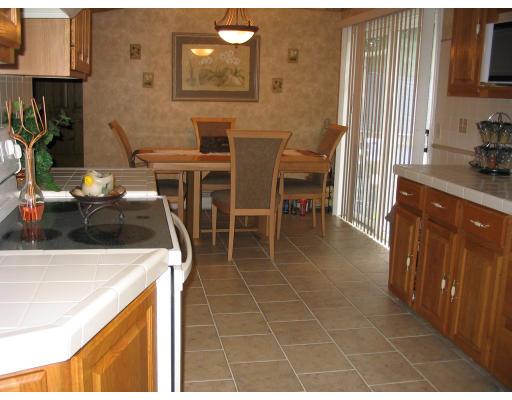 49 Newhall Street Springfield, MA 01109 - Photo 3 of 12 a kitchen with stainless steel appliances a sink a counter top space and a window