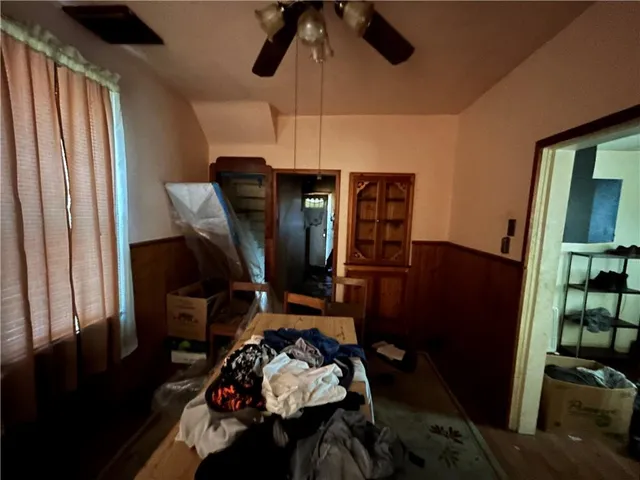 a view of workspace with wooden floor windows