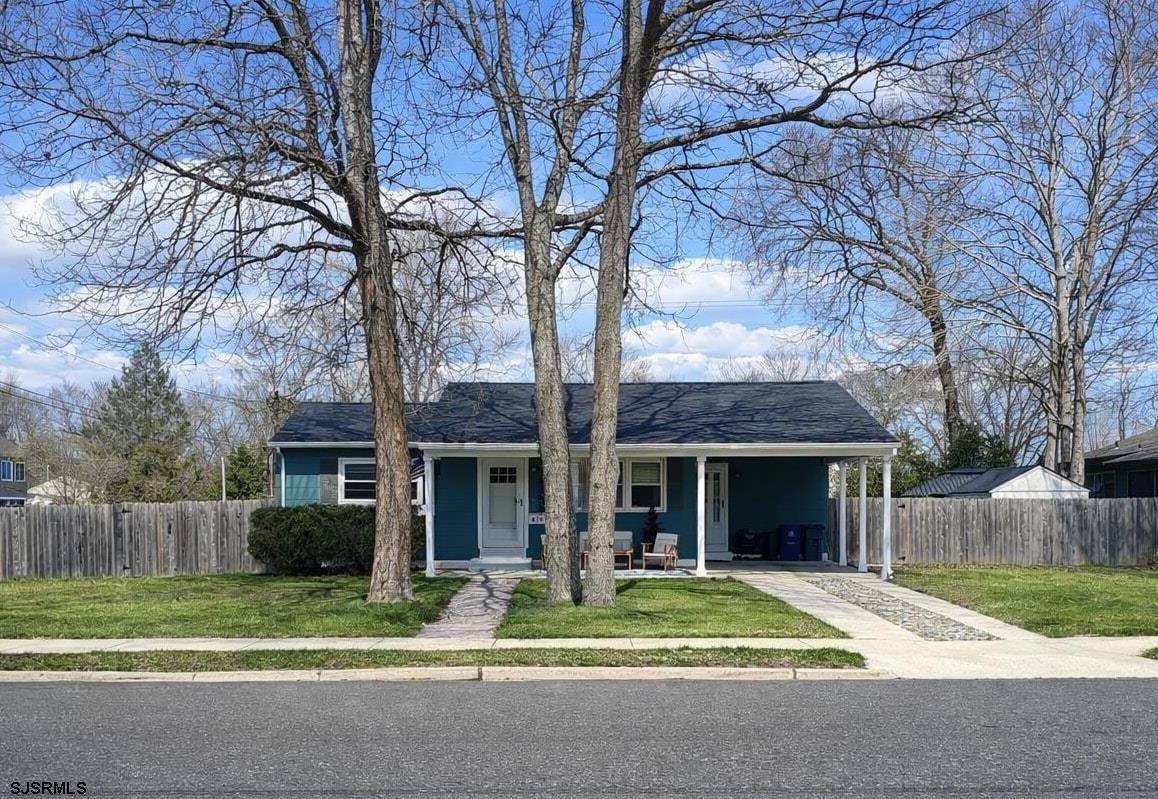 415 Rhode Island Avenue Somers Point, NJ 08244 - Photo 1 of 30 a brick house with trees in front of it