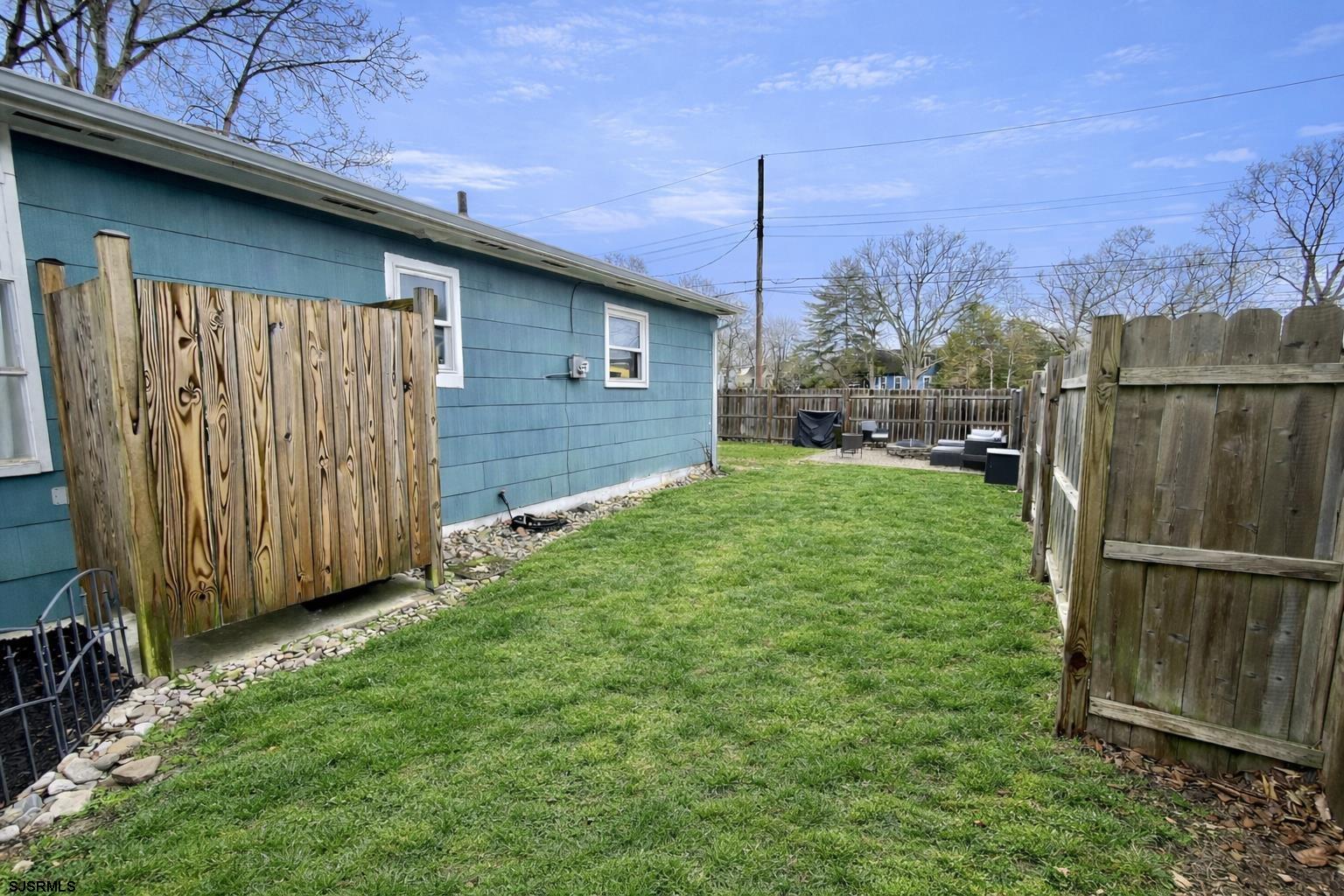 415 Rhode Island Avenue Somers Point, NJ 08244 - Photo 21 of 30 a view of a backyard with potted plants