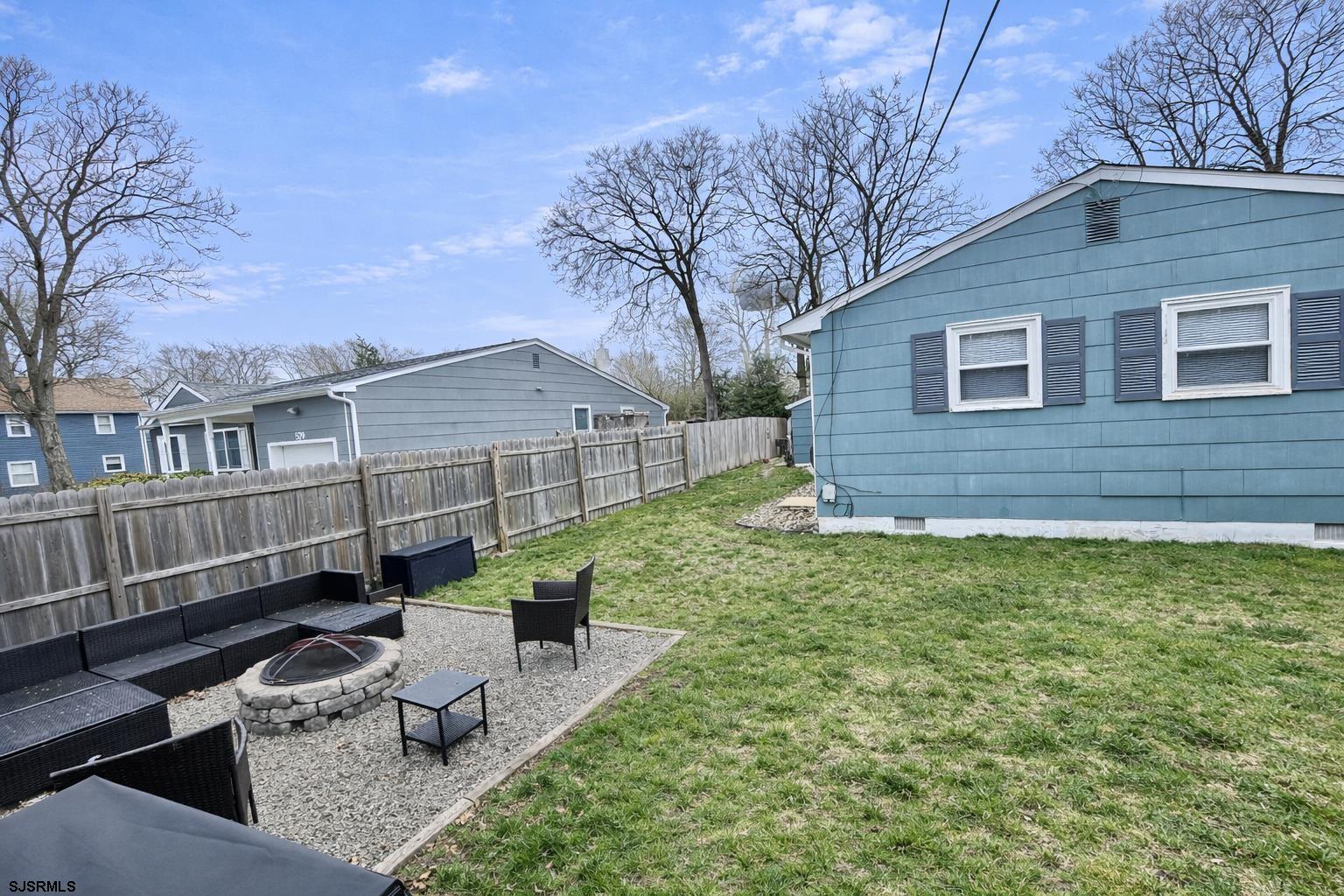 415 Rhode Island Avenue Somers Point, NJ 08244 - Photo 24 of 30 a view of a house with a yard