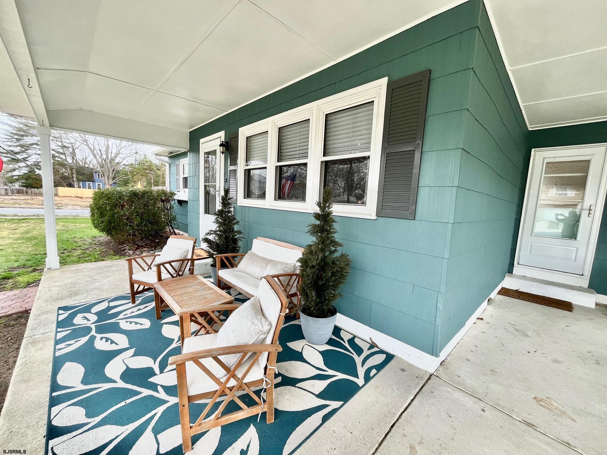 415 Rhode Island Avenue Somers Point, NJ 08244 - Photo 27 of 30 a view of backyard of a house with outdoor seating