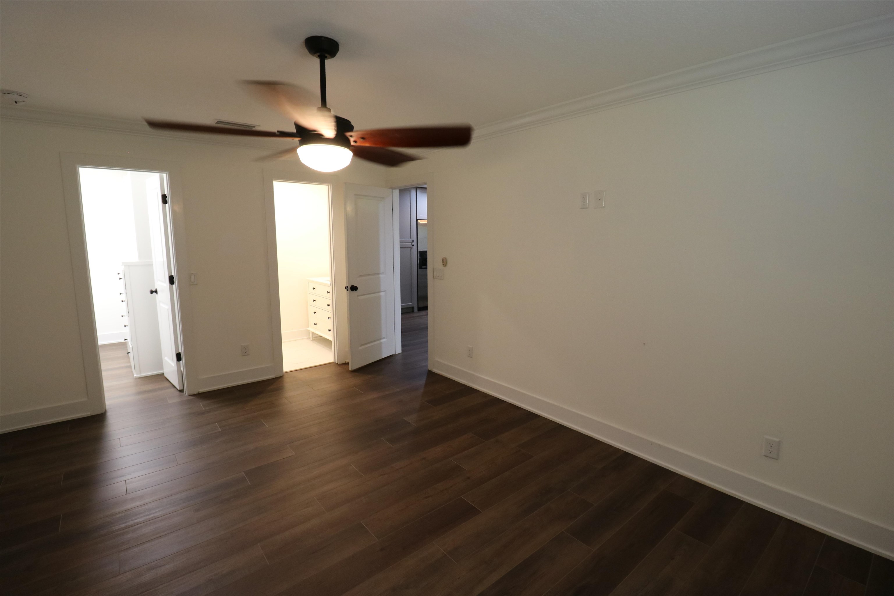 140 Seminole Road St. Augustine, FL 32086 - Photo 13 of 26 a view of an empty room with wooden floor