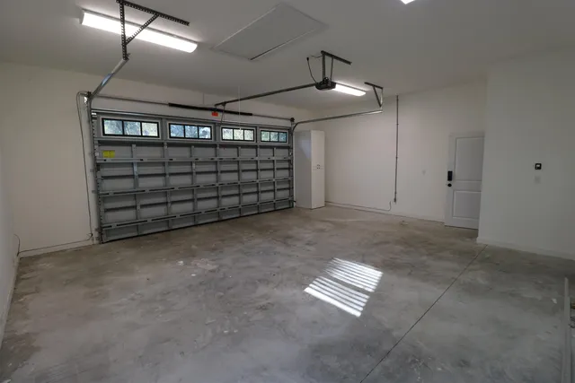 en empty room with windows