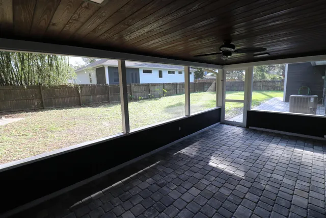 a bathroom with a large window