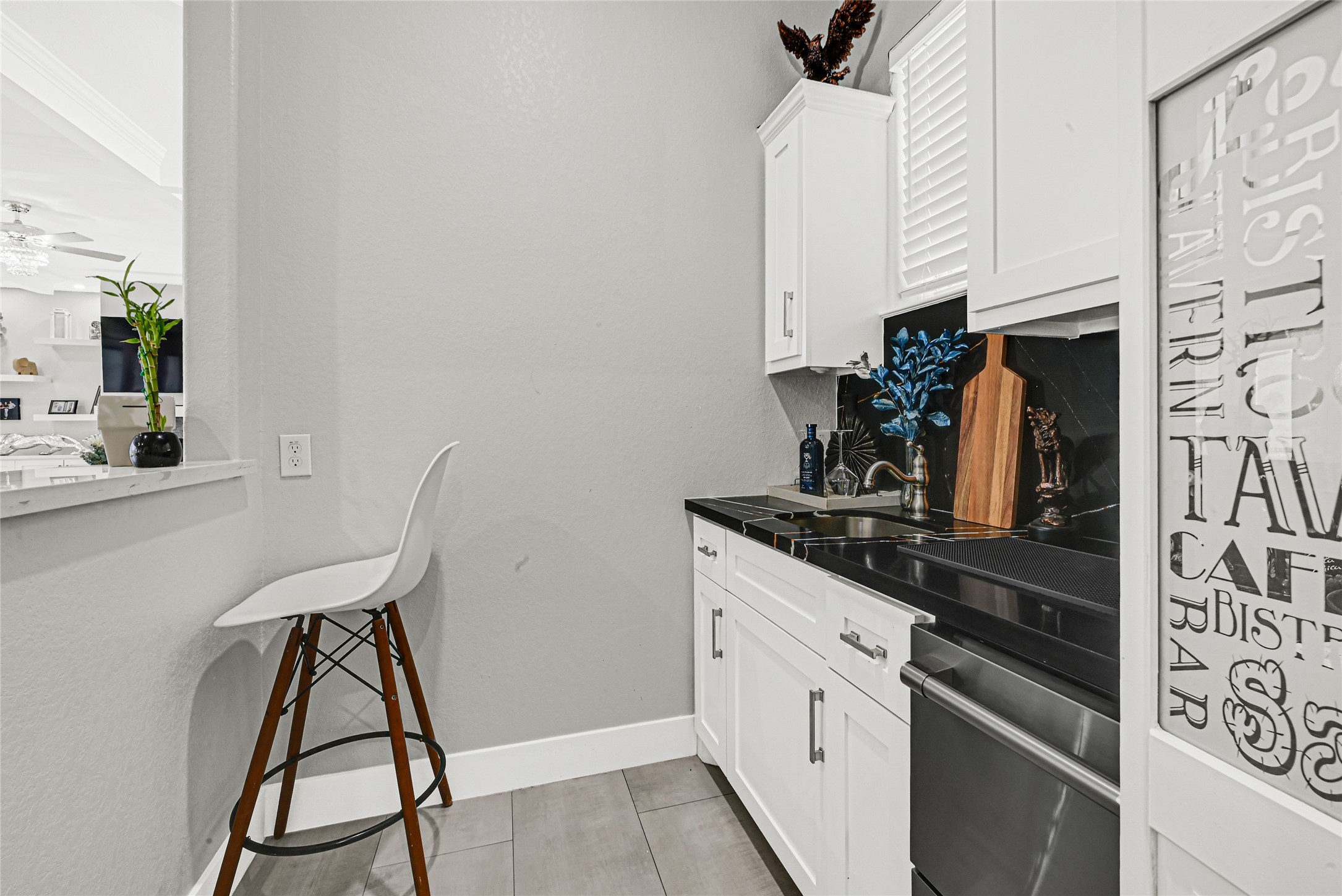 4821 1st Street Houston, TX 77504 - Photo 10 of 48 a kitchen with stainless steel appliances kitchen island a refrigerator sink and cabinets