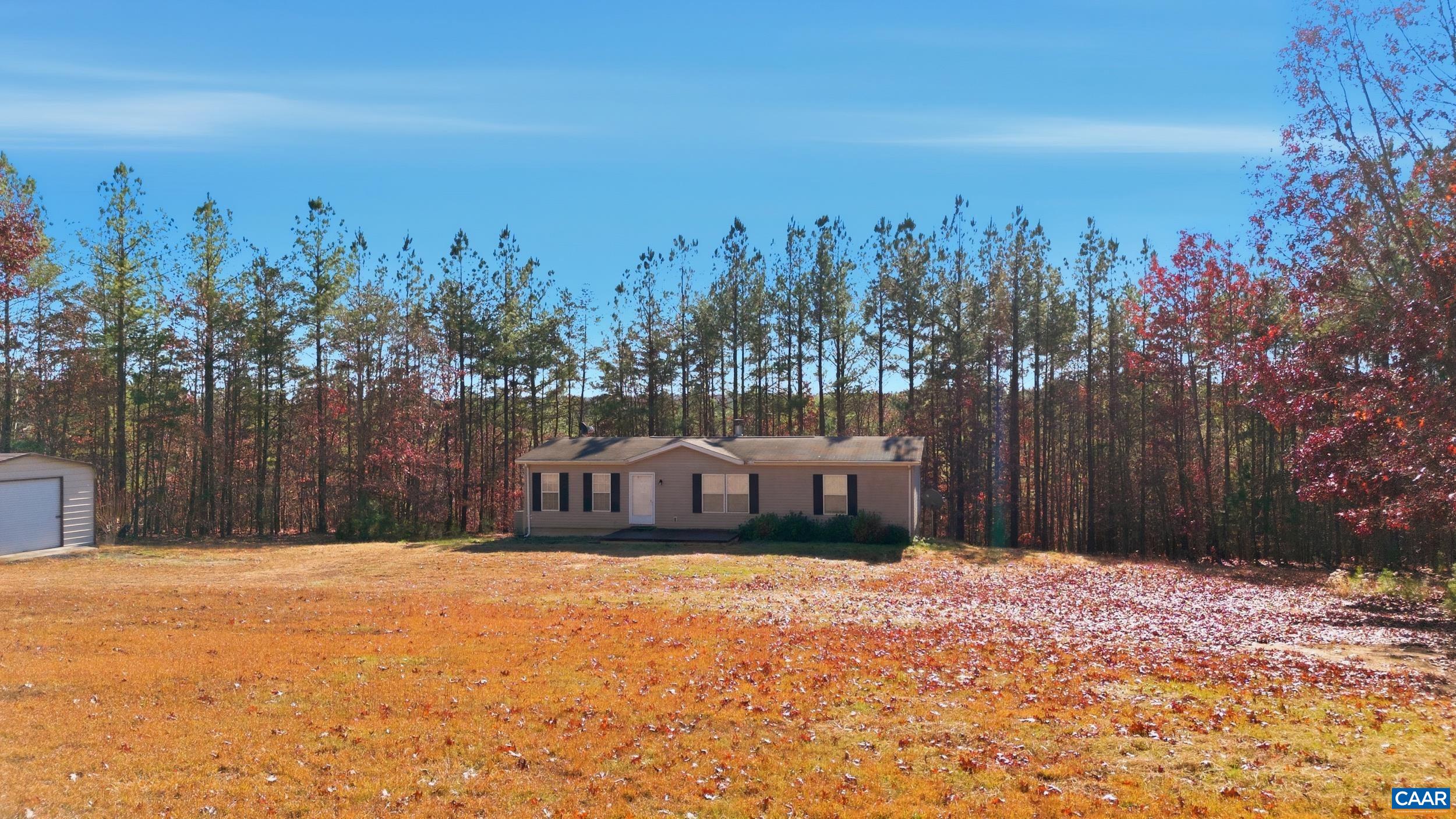 1690 Poorhouse Creek Road Appomattox, VA 24522 - Photo 28 of 44 a front view of a house with a yard