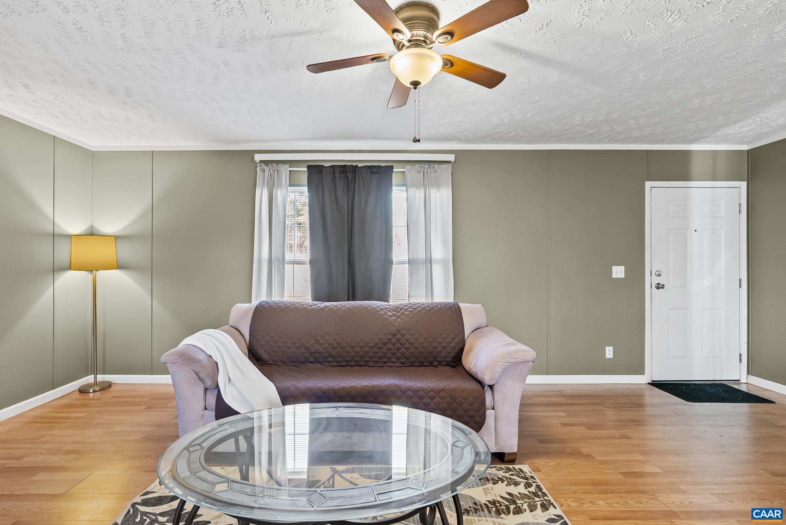 1690 Poorhouse Creek Road Appomattox, VA 24522 - Photo 3 of 44 a living room with furniture and a window